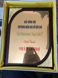 KỶ NIỆM CHƯƠNG GỖ ĐỒNG IN 03