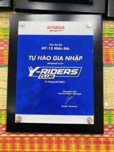 KỶ NIỆM CHƯƠNG GỖ ĐỒNG IN 04